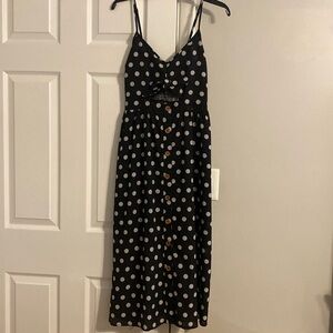 Size L black and white polka dot midi length dress.